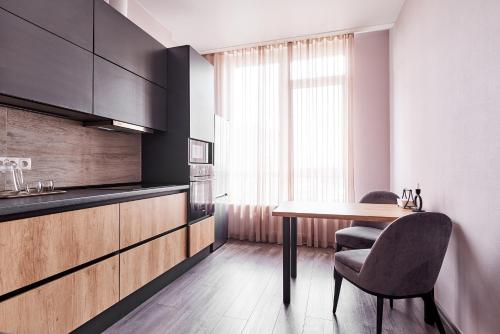 Cucina o angolo cottura di KADOR HOME HOTEL downtown