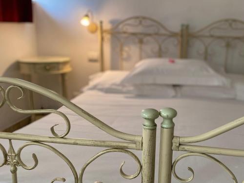 Postel nebo postele na pokoji v ubytování Mastro Vanni - Urban Masseria
