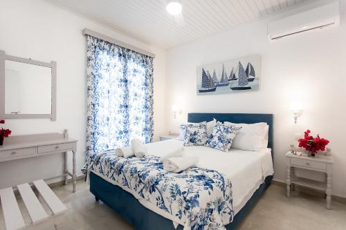 Posteľ alebo postele v izbe v ubytovaní oliva e mare luxury suite