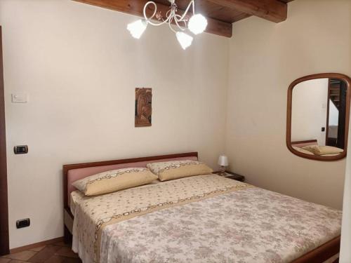 Кровать или кровати в номере casale martini sirolo