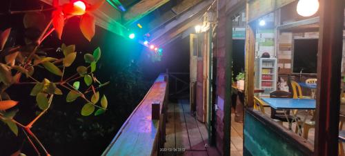 a room with a long table with a tableablish at Bungalow Mat Hj Limah in Alor Setar