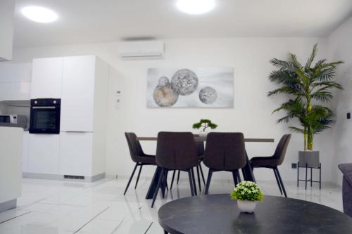 Kuchyň nebo kuchyňský kout v ubytování Apartmani Magić