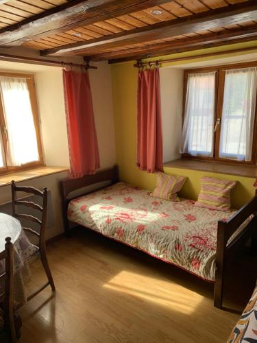 Llit o llits en una habitació de Appartement Style Rustique