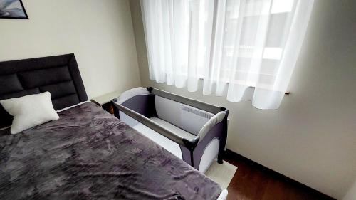 Krevet ili kreveti u jedinici u objektu Mundus Apartman Zlatibor