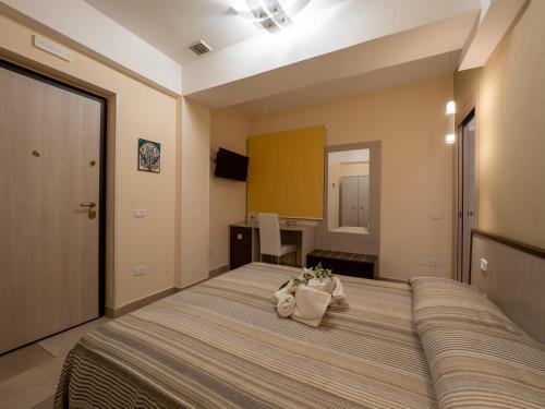Cama o camas de una habitación en B&B Villa Lisa