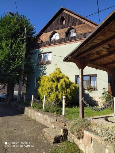 a house with a chain in front of it at Penzion u Lípy in Děčín