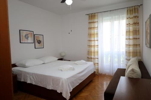 Posteľ alebo postele v izbe v ubytovaní Vila Jasna