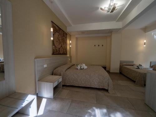 Cama o camas de una habitación en B&B Villa Lisa