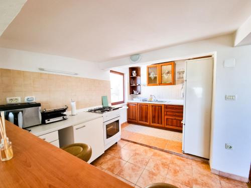 Una cocina o cocineta en Apartma Olivia