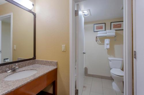 a bathroom with a sink and a toilet at Comfort Inn & Suites Woods Cross - Salt Lake City North in Woods Cross