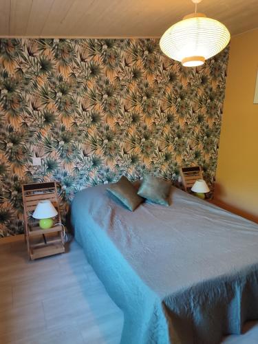 Säng eller sängar i ett rum på Villa Casaleno gite La Cigale avec wi-fi