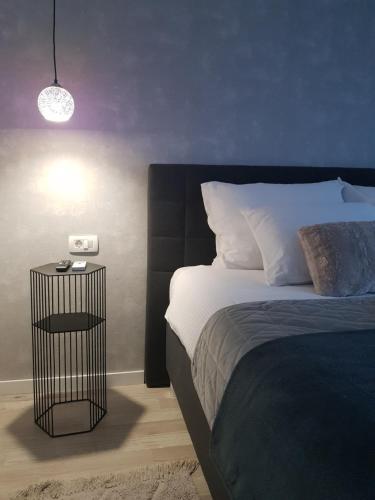 Posteľ alebo postele v izbe v ubytovaní Rooms Vanteo