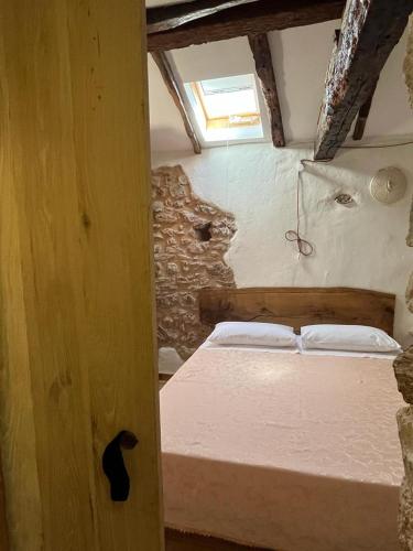Postel nebo postele na pokoji v ubytování DOMUS VELA