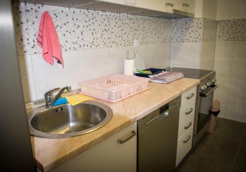 Virtuvė arba virtuvėlė apgyvendinimo įstaigoje Apartment Sunce