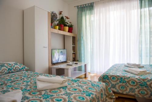 Apartment Sunce 객실 침대