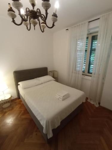 Posteľ alebo postele v izbe v ubytovaní Damjan Rooms