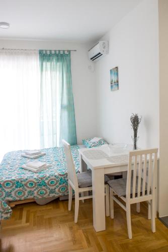 Lova arba lovos apgyvendinimo įstaigoje Apartment Sunce