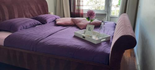 Ένα ή περισσότερα κρεβάτια σε δωμάτιο στο Sunny Guesthouse