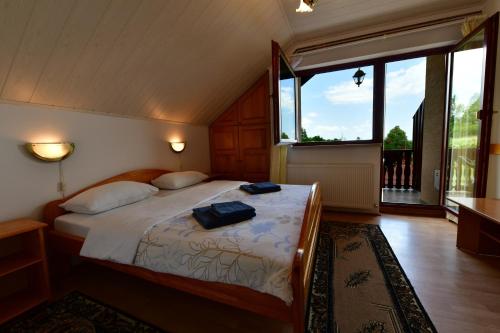 Postel nebo postele na pokoji v ubytování Guesthouse Ante Hodak