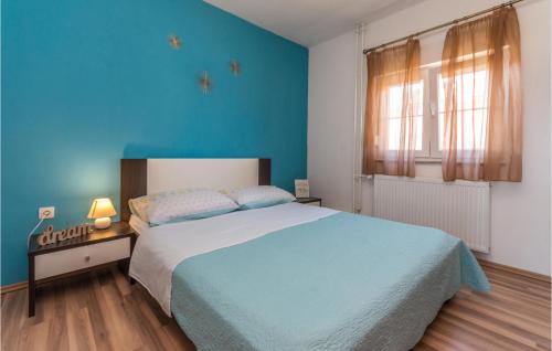 Ένα ή περισσότερα κρεβάτια σε δωμάτιο στο Lovely Home In Bibinje With Outdoor Swimming Pool