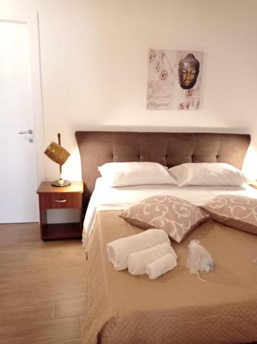 Postel nebo postele na pokoji v ubytování Casa vacanze Pupo centro storico