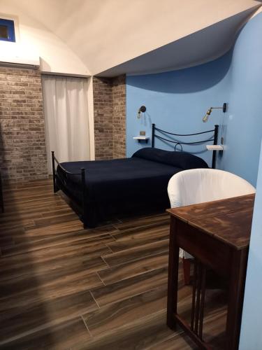 Ένα ή περισσότερα κρεβάτια σε δωμάτιο στο Sea house b&b