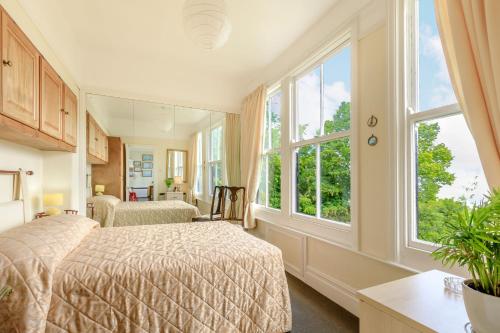 Ένα ή περισσότερα κρεβάτια σε δωμάτιο στο Clooneavin Apartment 6