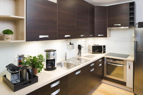 Η κουζίνα ή μικρή κουζίνα στο Montmartre Residence