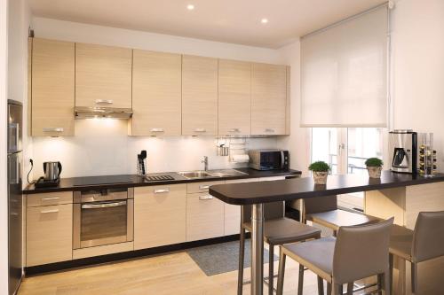 Η κουζίνα ή μικρή κουζίνα στο Montmartre Residence