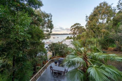an overhead view of a deck with a view of a river at The View, Metung in Metung