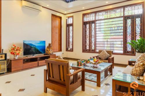 Televisyen dan/atau pusat hiburan di Su's Villa Hà Giang