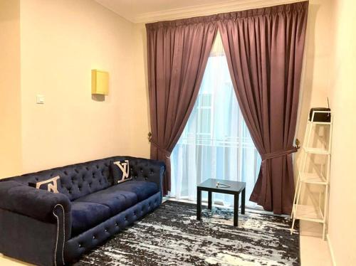 Ruang duduk di 13StayCation Islamic Homestay