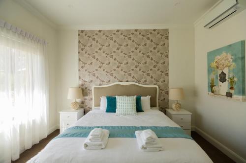 Katil atau katil-katil dalam bilik di Chateau Yaldara House