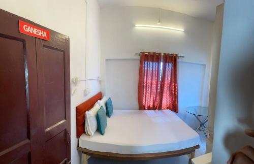 Un ou plusieurs lits dans un hébergement de l'établissement Yogg Hostel