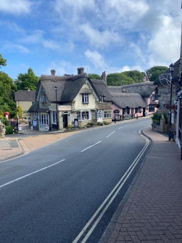an empty street in a small town with houses at The Bay house Apartments , shanklin in Shanklin