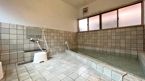 Bilik mandi di Tougoukan