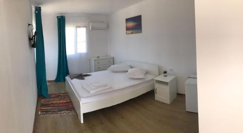 Postel nebo postele na pokoji v ubytování Casa Dada