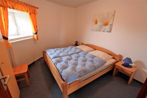 Ένα ή περισσότερα κρεβάτια σε δωμάτιο στο "Ferienhof Alte Mühle" M 2