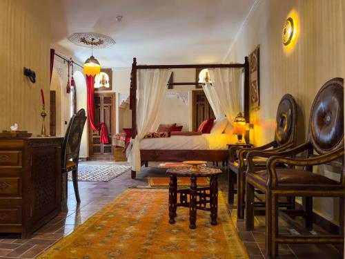 Postel nebo postele na pokoji v ubytování Perlekech Riad & Spa