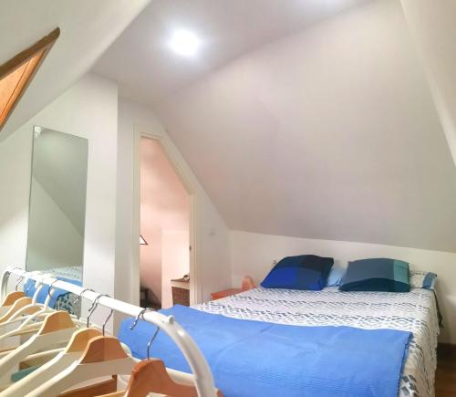 Postel nebo postele na pokoji v ubytování Ático dúplex con vistas