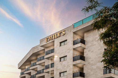 a rendering of the exterior of an apartment building at Emily's Hotel in Tiberias