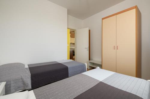 Postel nebo postele na pokoji v ubytování Apartment Sugar
