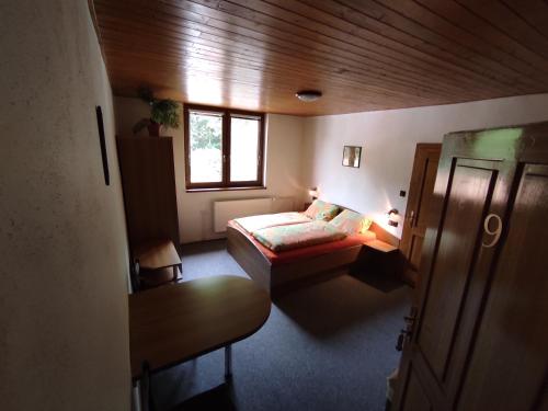 Postel nebo postele na pokoji v ubytování Apartmány Vranov