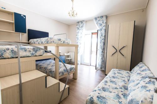 A bed or beds in a room at Terrazza La Delizia