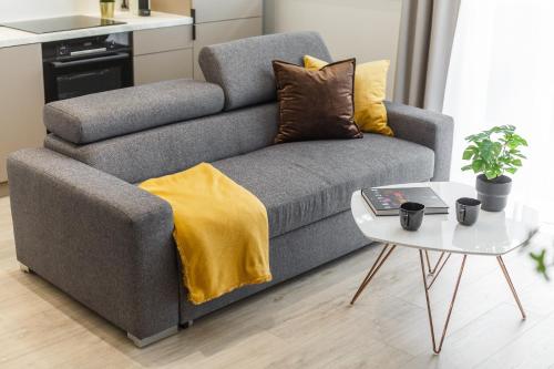 Ruang duduk di Emihouse Skyline Apartments
