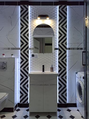 Kúpeľňa v ubytovaní Apartament Czarna Perła