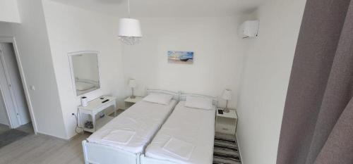 Postel nebo postele na pokoji v ubytování Teresa house