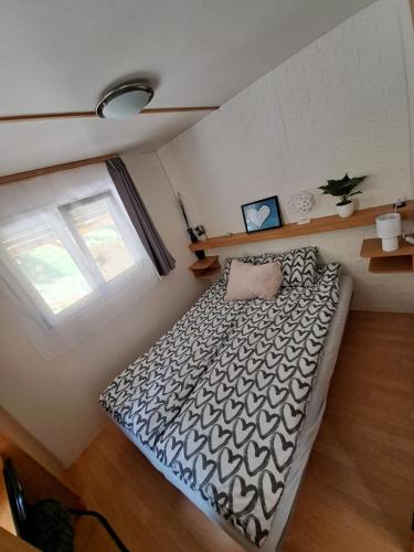 Postel nebo postele na pokoji v ubytování Lexi Zen House