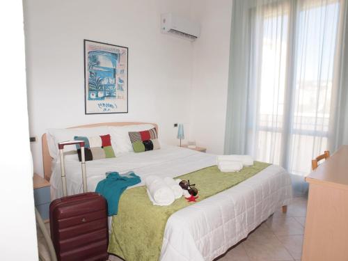 Ένα ή περισσότερα κρεβάτια σε δωμάτιο στο Locanda Basement Rooms