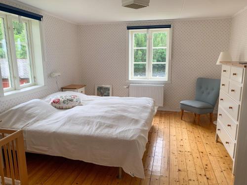 Кровать или кровати в номере Holiday home Tussered Hacksvik